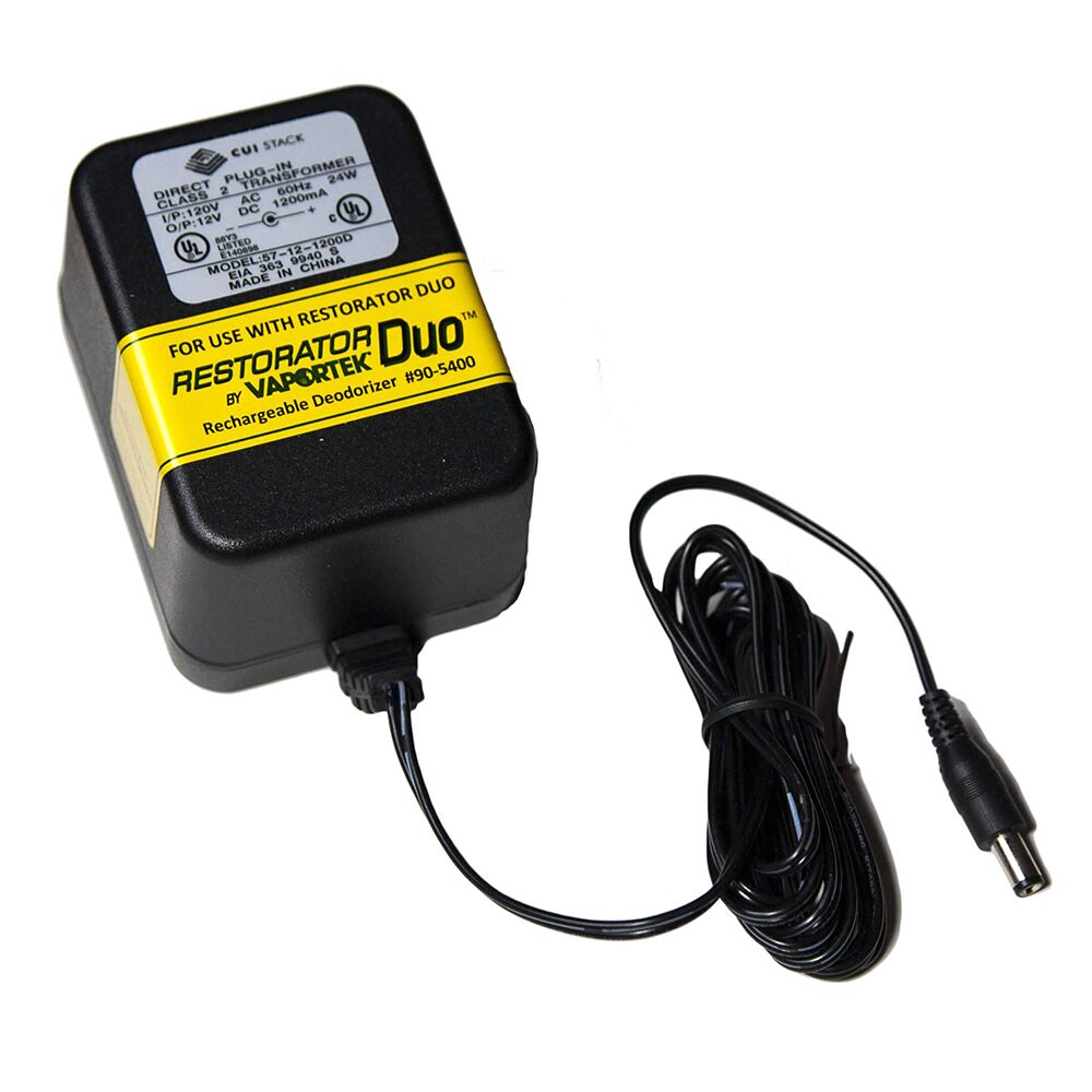 Black power adapter with yellow label stating For use with Restorator DUO® by Vaportek, featuring a long power cord and barrel connector.