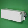 The Optimum 4000 is a white rectangular wall-mounted box with a clear front panel secured by a silver padlock, shown against a green background.